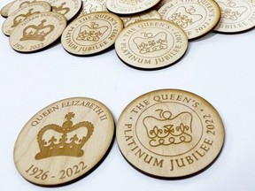View of LulaandGray's wooden Queen Elizabeth tokens displayed in Macclesfield, Britain in this undated handout image.