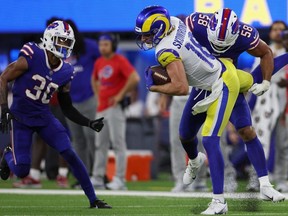 Rams wide receiver Ben Skowronek (18) is tackled by Bills linebacker Matt Milano (58) after a reception during fourth quarter NFL action at SoFi Stadium in Inglewood, Calif., Thursday, on Sept. 8, 2022.