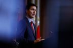 Canada's Prime Minister Justin Trudeau takes part in a news conference about the federal government's response to Hurricane Fiona, later downgraded to post-tropical storm, in Ottawa, on Sept. 26, 2022.