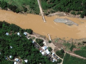A satellite image shows a flooded bridge in the aftermath of Hurricane Fiona, in Arecibo, Puerto Rico Sept. 21, 2022.