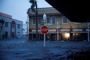 A flooded street is seen in downtown as Hurricane Ian makes landfall in southwestern Florida, in Fort Myers, Fla., Sept. 28, 2022.