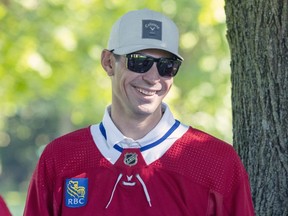 Montreal Canadiens goaltender Carey Price wears his jersey, now featuring an advertising logo, prior to the team's annual golf tournament in Laval, Que., on Sept. 12, 2022.