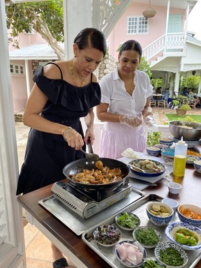 Cookbook authors and TV personalities Michelle, left, and Suzanne Rousseau prepare fresh, local, seasonal ingredients with modern Mediterranean flavour in the garden at Summerhouse. Cynthia McLeod/Toronto Sun