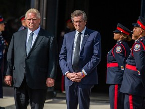 Ontario Premier Doug Ford (left) and Toronto Mayor John Tory, at the funeral for Const. Andrew Hong at the Toronto Congress Centre on Wednesday September 21, 2022. On September 12, 2022, 48-year-old Const. Andrew Hong died in the line of duty.