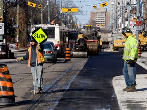 Construction workers paving Roncesvalles Ave in Toronto in 2010.