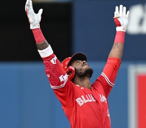 Toronto Blue Jays left fielder Raimel Tapia reacts after hitting a three RBI double against the Baltimore Orioles. Dan Hamilton-USA TODAY Sports