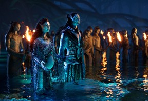 Kate Winslet, left, and Cliff Curtis play members of the Metkayina, a Na’vi clan, in Avatar: The Way of Water.