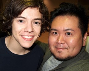 Toronto entertainment blogger Mr. Will Wong (right), pictured here with Harry Styles (left) in 2012 during a One Direction concert stop in the city, is delighted with Styles' return to the city for TIFF 2022.