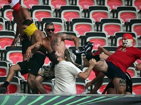 FC Cologne and  Nice's supporters fight ahead of the UEFA Europa Conference League football match between Nice and FC Cologne at the Allianz Riviera in Nice, on September 8, 2022.