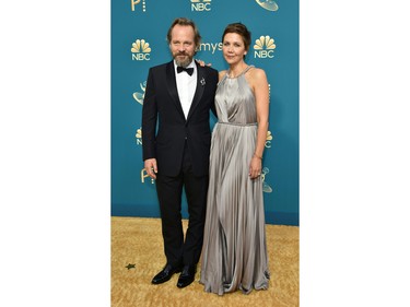 Peter Sarsgaard and Maggie Gyllenhaal arrive for the 74th Emmy Awards at the Microsoft Theater in Los Angeles, Calif., on Sept. 12, 2022.