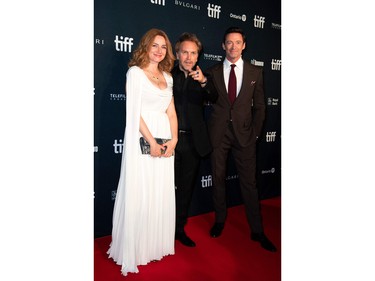 Actress Marine Delterme, left, director Florian Zeller, centre, and actor Hugh Jackman attend the "Son" premiere during the 2022 Toronto International Film Festival at Roy Thompson Hall on Sept. 12, 2022 in Toronto.