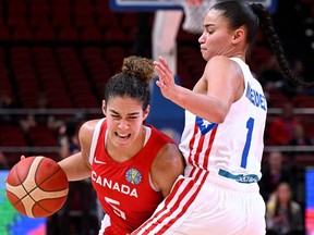 Canada's Kia Nurse drives to the basket past Puerto Rico's Tayra Melendez during the 2022 Women's Basketball World Cup quarter-final match between Puerto Rico and Canada at Sydneydome on September 29, 2022, in Sydney.