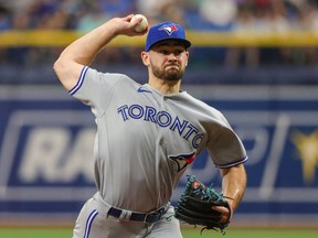 Sep 25, 2022; St. Petersburg, Florida, USA; Toronto Blue Jays relief pitcher Zach Pop (56) throws a pitch during the sixth inning against the Tampa Bay Rays at Tropicana Field.