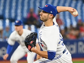 Toronto Blue Jays' starting pitcher Julian Merryweather throws to a Tampa Bay Rays batter in first inning American League baseball action during the first game of a double header in Toronto, Tuesday, Sept. 13, 2022.