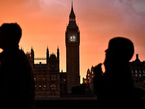 Big Ben is pictured on Sept. 18 2022 as mourners stand in a queue to pay their respects to  Queen Elizabeth II in London.