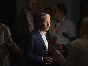 Minister of Innovation, Science and Industry Francois-Philippe Champagne speaks to reporters at the Liberal summer caucus retreat in St. Andrews, N.B., Sept. 13, 2022.