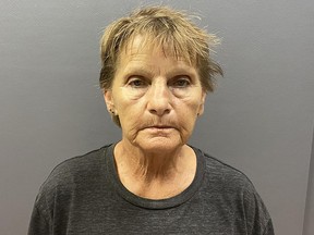 Christine Walters, 65, is seen in her booking photo.