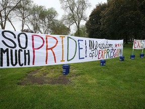 A sign celebrating the North Idaho Pride Alliance's Pride in the Park event is displayed at City Park in Coeur d'Alene, Idaho, Saturday, June 11, 2022.