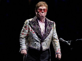 In this Jan. 19, 2022 file photo, Elton John performs as he returns to complete his Farewell Yellow Brick Road Tour since it was postponed due to COVID-19 restrictions in 2020, in New Orleans, La.