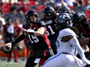 Ottawa Redblacks quarterback Nick Arbuckle (19) throws the ball during first half CFL football action against the Toronto Argonauts, in Ottawa on Saturday, Sept. 10, 2022.