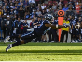 Toronto Argonauts wide receiver Cam Phillips (89) dives for the ball during fourth quarter CFL action against the Ottawa Redblacks, in Toronto on Sunday July, 31, 2022.