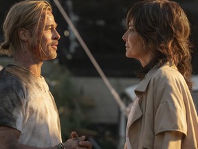 This image released by Sony Pictures shows Brad Pitt, left, and Sandra Bullock in a scene from the film "Bullet Train."