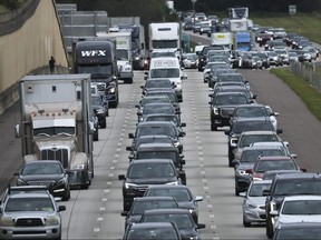 Traffic moves slowly on I-4 East as residents evacuate the Gulf Coast of Florida in advance of the arrival of Hurricane Ian on Sept. 27, 2022 in Four Corners, Fla.