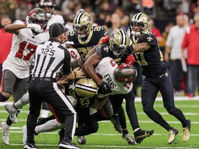 Sep 18, 2022; New Orleans, Louisiana, USA;  New Orleans Saints cornerback Marshon Lattimore (23) and safety Marcus Maye (6) get into a penalty with Tampa Bay Buccaneers wide receiver Mike Evans (13) and they are ejected after the play during the second half at Caesars Superdome.