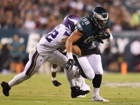 Sep 19, 2022; Philadelphia, Pennsylvania, USA; Philadelphia Eagles tight end Dallas Goedert (88) makes a first down catch past Minnesota Vikings safety Harrison Smith (22) during the second quarter at Lincoln Financial Field.