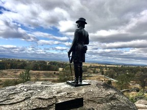 Statue of Union Gen. Gouverneur K. Warren surveying Little Round Top. Lance Hornby/Toronto Sun