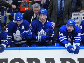 May 10, 2022; Toronto, Ontario, CAN; Toronto Maple Leafs head coach Sheldon Keefe congratulates Mitchell Marner (16) and forward Michael Bunting (58) on assisting on the goal by forward Auston Matthews (34) against the Tampa Bay Lightning during the third period of game five of the first round of the 2022 Stanley Cup Playoffs at Scotiabank Arena.