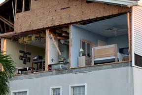 A wall of a condo was torn off as Hurricane Ian passed through on Sept. 30, 2022 in Fort Myers, Fla.