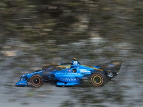 Chip Ganassi Racing driver Jimmie Johnson, of the U.S., brakes into Turn 9 during the IndyCar season finale auto race at Laguna Seca Raceway on Sunday, Sept. 11, 2022, Monterey, Calif.