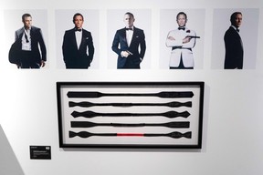 Black bow ties, signed and worn by British actor Daniel Craig in the five James Bond films he starred in, are displayed during a photocall ahead of the “Sixty Years of James Bond” auction at Christie’s auction house in London on Sept. 26, 2022.