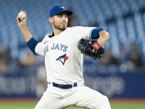 Toronto Blue Jays starting pitcher Julian Merryweather throws a pitch against the Tampa Bay Rays during the first inning at Rogers Centre on Sept. 13, 2022.
