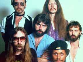 John Hartman, top left, is pictured with his Doobie Brothers bandmates in this photo taken in 1976.