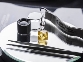 Owners of a diamond mine in the Northwest Territories say workers have recovered what is likely Canada's largest fancy vivid yellow diamond. The Arctic Canadian Diamond Company says the 71.26-carat diamond was recovered from its Ekati mine on Aug. 25, 2022.