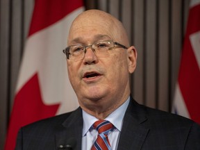 Minister of Municipal Affairs and Housing Steve Clark makes an announcement in the Ontario Legislature, in Toronto, Monday, Dec. 7, 2020.