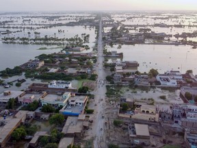 This aerial photograph taken on Sept. 1, 2022 shows flooded residential areas after heavy monsoon rains in Dera Allah Yar town of Jaffarabad district, Balochistan province.