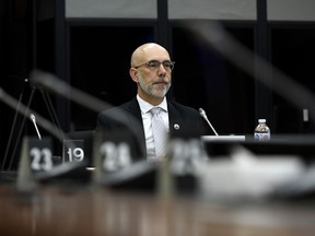 Parliamentary Budget Officer Yves Giroux prepares to appear before the Senate Committee on Official Languages, in Ottawa, on Monday, June 13, 2022.&ampnbsp;The parliamentary budget officer estimates the Liberal bill proposing to double the GST rebate will cost $2.6 billion.