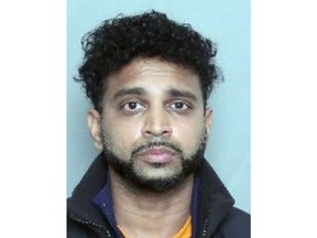 Trevin Asantarajah, 34, is pictured in a photo provided by Toronto Police.