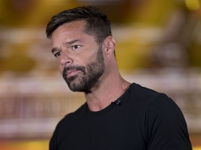 Puerto Rican singer Ricky Martin listens to a question during an interview in San Juan, Puerto Rico, Jan. 27, 2020.
