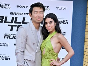 Canadian actor Simu Liu and actress Jade Bender attend the Los Angeles premiere of "Bullet Train" at the Regency Village theatre in Westwood, California, Aug. 1, 2022.