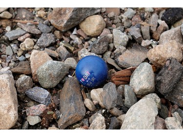 A ball stating, "Today is a New Day" lies amidst the damage after the arrival of Hurricane Fiona in Port Aux Basques, Newfoundland, Sept. 25, 2022.