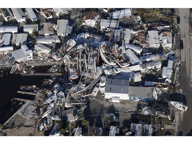 An aerial view of damaged boats and property after Hurricane Ian caused widespread destruction in Fort Myers, Fla., Sept. 30, 2022.