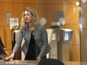 Former Theranos CEO Elizabeth Holmes goes through a security checkpoint as she arrives at federal court on September 01, 2022 in San Jose, California.