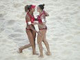 Canada's Brandie Wilkerson, left, and Canada's Sophie Bukovec celebrate during the beach volley final match between Canada's Bukovec-Brandie and Brazil's Duda-Ana Patricia at the beach volley World Championships in Rome, Sunday, June 19, 2022.