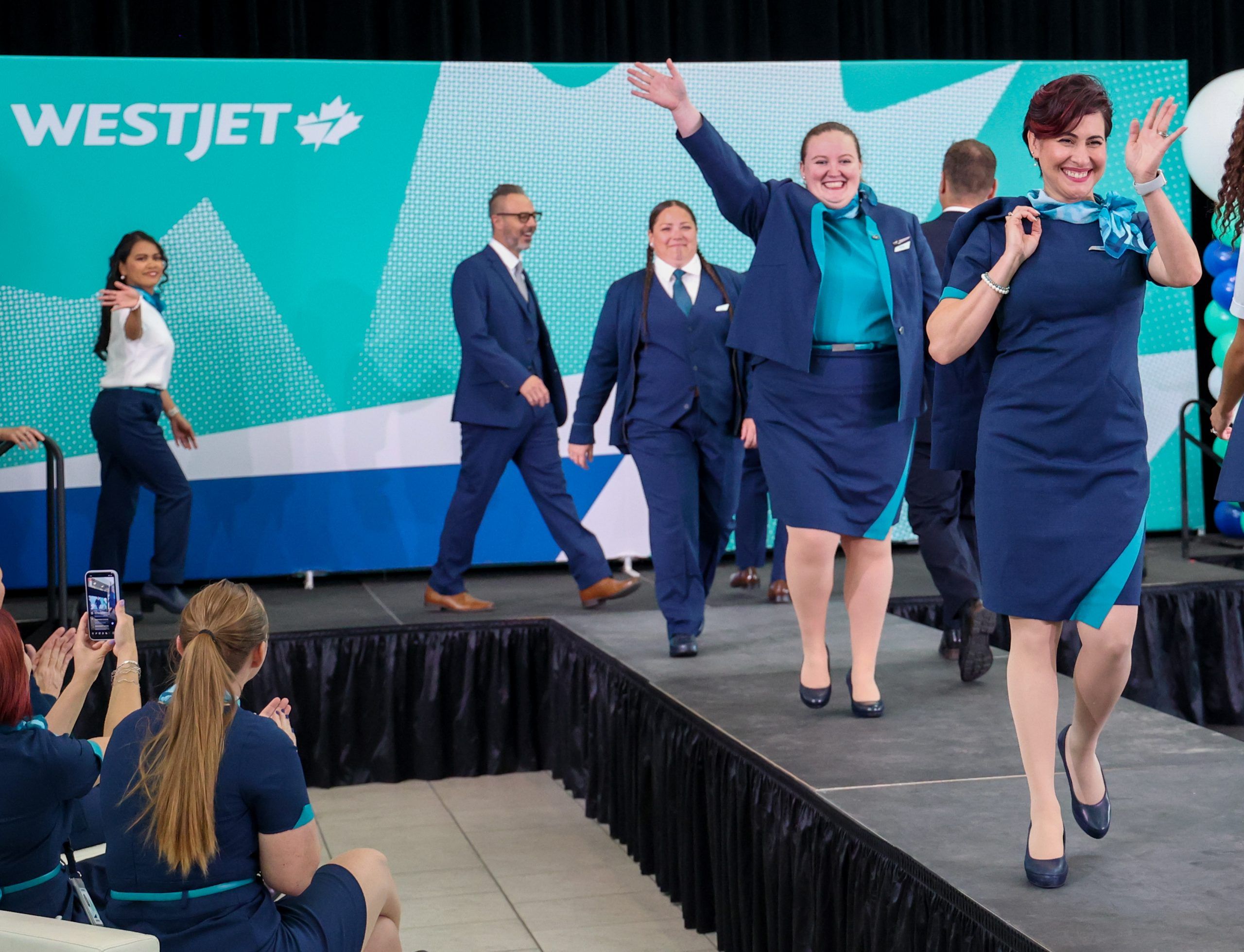 westjet-debuts-new-gender-neutral-uniforms-with-name-tag-for-pronouns