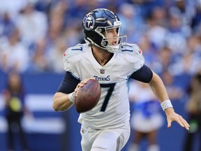 Ryan Tannehill of the Tennessee Titans attempts a pass during the fourth quarter against the Indianapolis Colts.