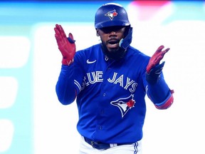 Teoscar Hernandez of the Toronto Blue Jays celebrates after hitting a home run during the fourth inning in Game 2 of an American League Wild Card Series at Rogers Centre on Oct. 8, 2022.